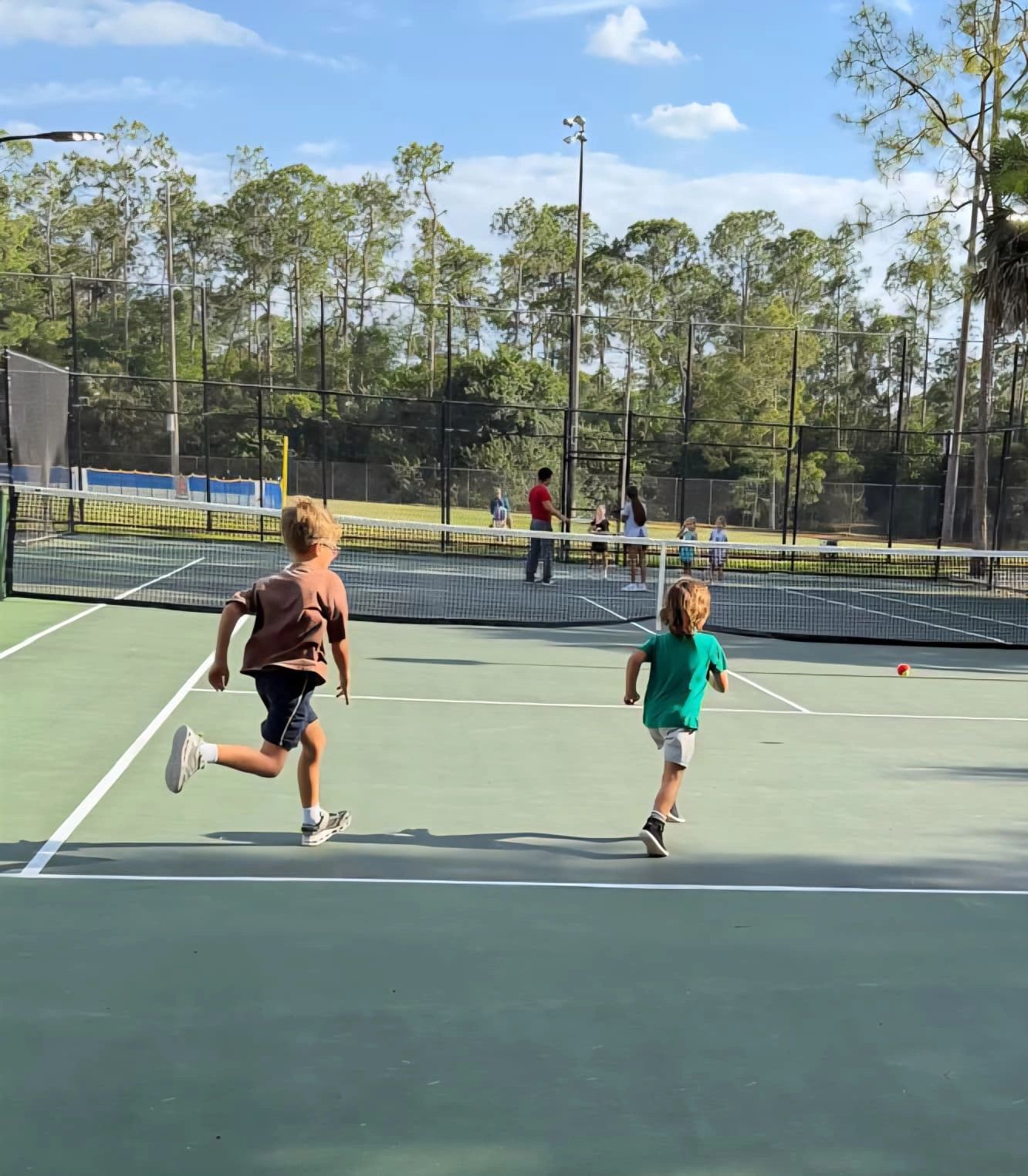 Children tennis class group activity